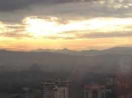 Long distance view of Gunung Besar Hantu from Kuala Lumpur. It's the tallest peak in the centre of the picture