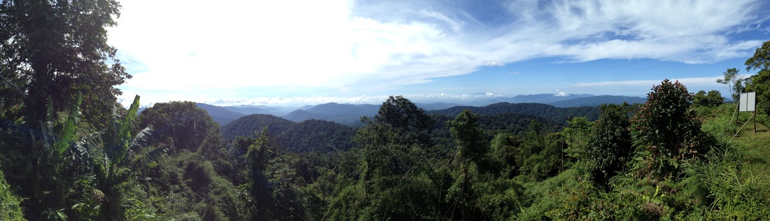 A beautiful panorama scene from the top of Gunung Telapak Buruk roughly covering west to south. See the story for description of the mountains