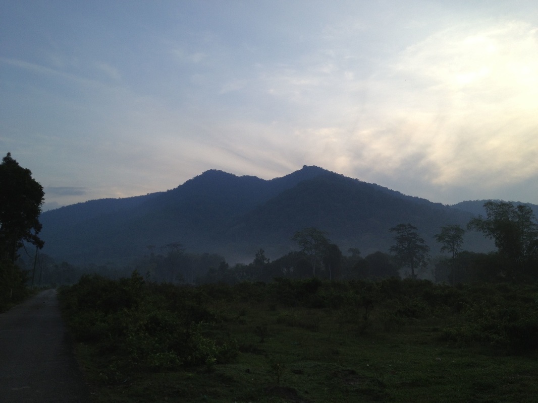 A better view of Gunung Datuk from the west. The Gunung Datuk boulder ledge can be clearly seen just to the left of the tallest point